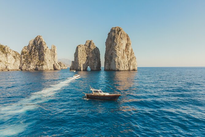 Sorrento: Capri Boat Small Group Tour Up to 8 & 4 hours ashore - The coastline run: Sorrento views, Marina Grande, and Roman traces