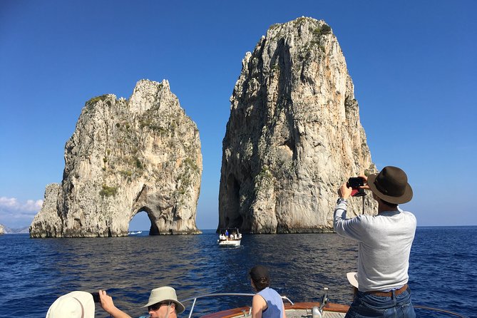 Sorrento: Capri Select Boat Trip with Swim, Drinks & Pick Up - Onboard Comfort, Drinks, And The Pace Of The Day