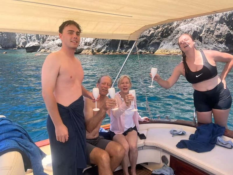 Sorrento Sunset Cruise with Aperitif on Board - Marina Grande to Puolo Beach: postcard Sorrento in stages