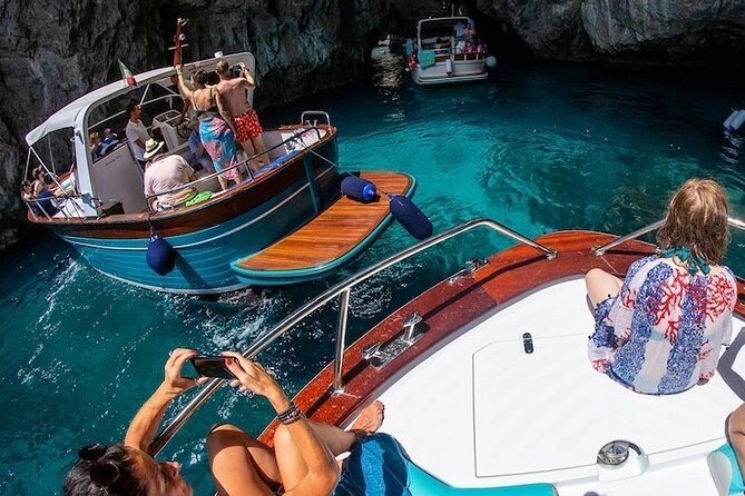 Sorrento to Capri: Small Group Boat Tour with Blue Grotto - Faraglioni rock stacks: the Capri silhouette in 10 minutes