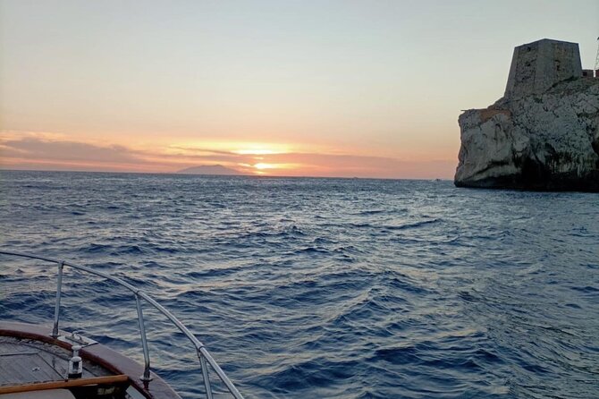 Sunset - The boat experience at golden hour, including close-up waterfall moments