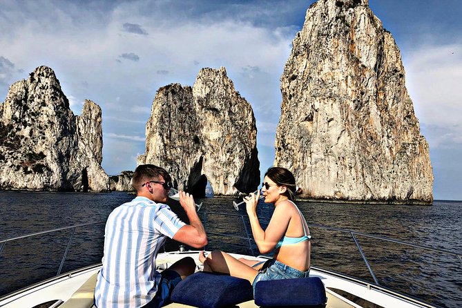 Sunset at Faraglioni rocks - unforgettable overnight stay – Capri - Sunset cruise magic around Capri’s Faraglioni
