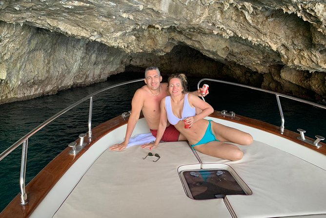 Sunset boat experience in Sorrento coast - The Coastal Cruise to Massa Lubrense: Cliffs, Photos, and Sea Air