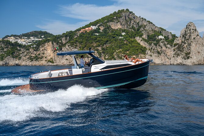 The Blue Fever: Capri island day cruise - Bagni Regina Giovanna: ruins on the rock with sea views
